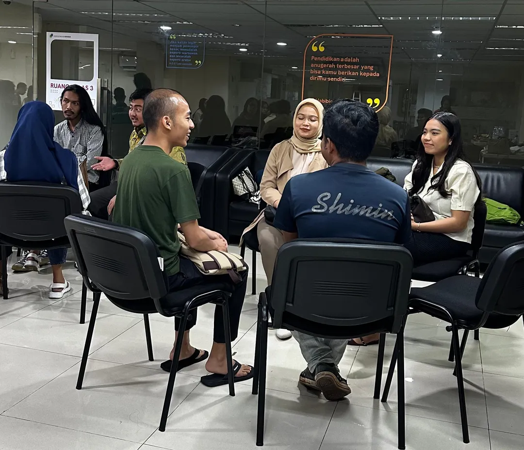 Students working on grammar exercises